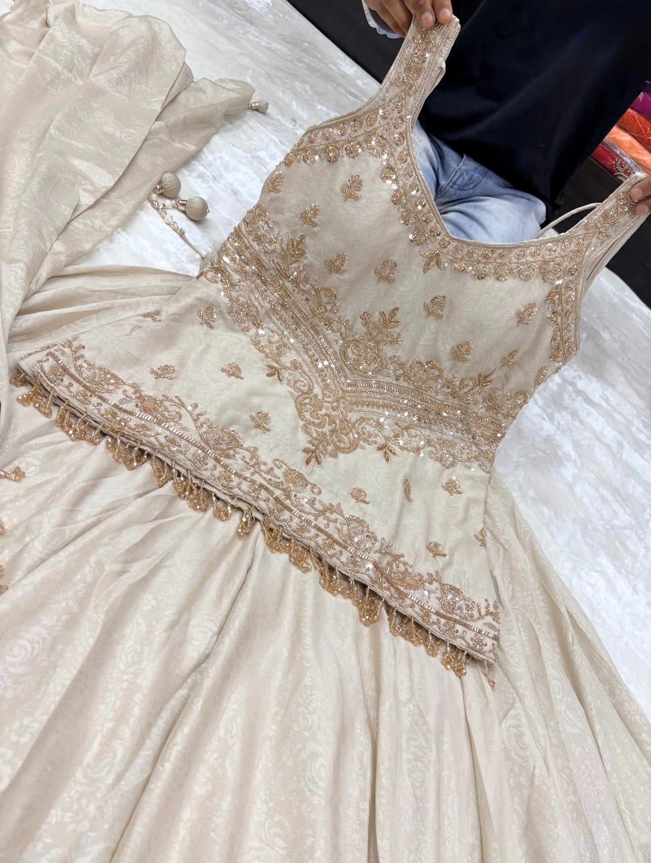 Off white with gold stunning handwork sharara suit