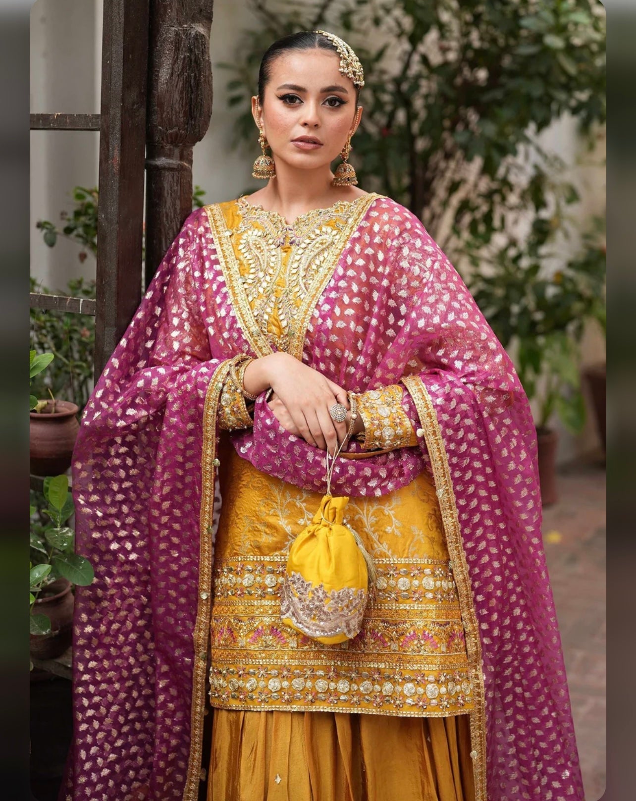 Yellow super stunning sharara set with pink dupatta