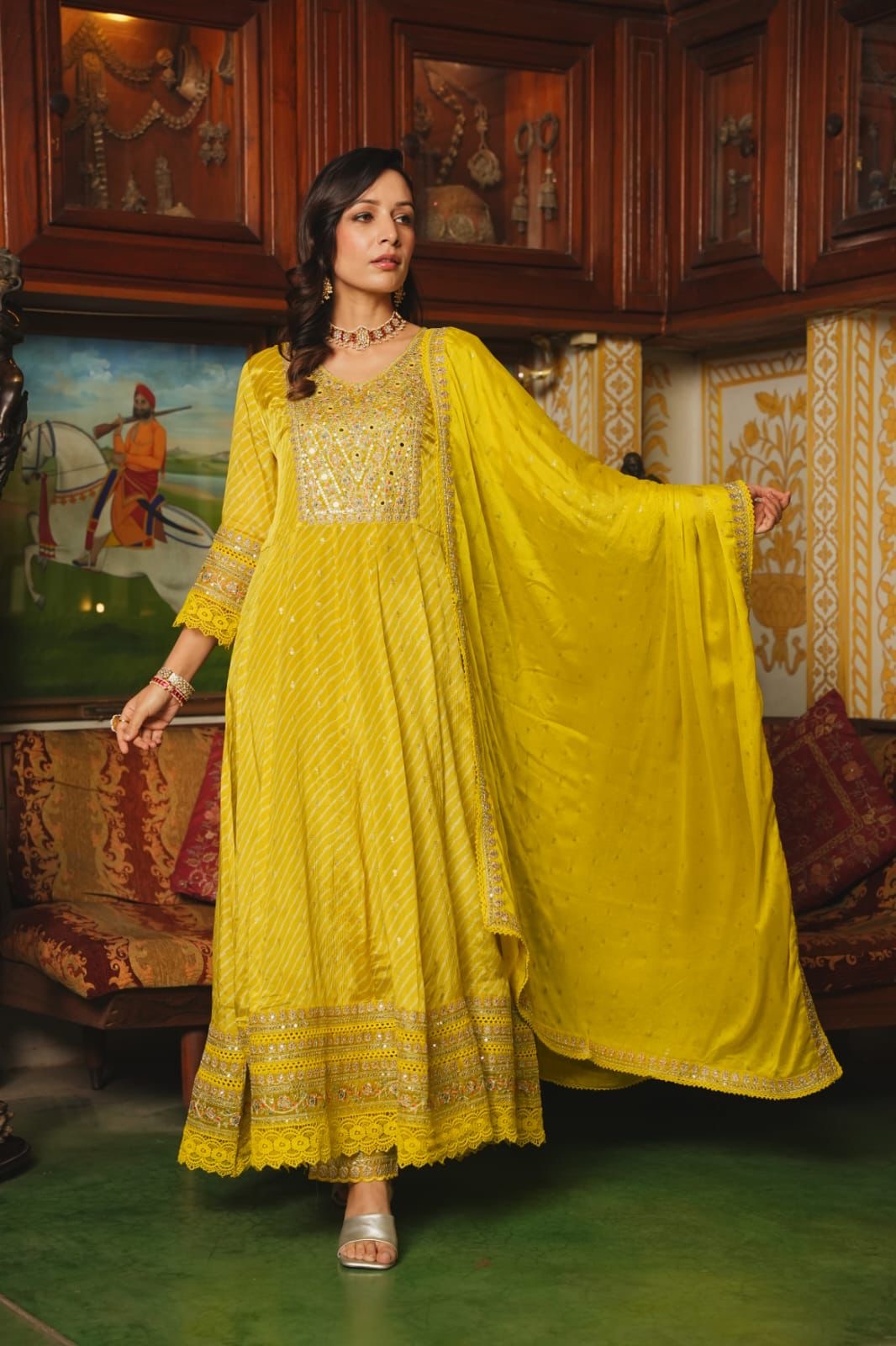 Yellow premium chinnon silk anarkali suit with heavy work
