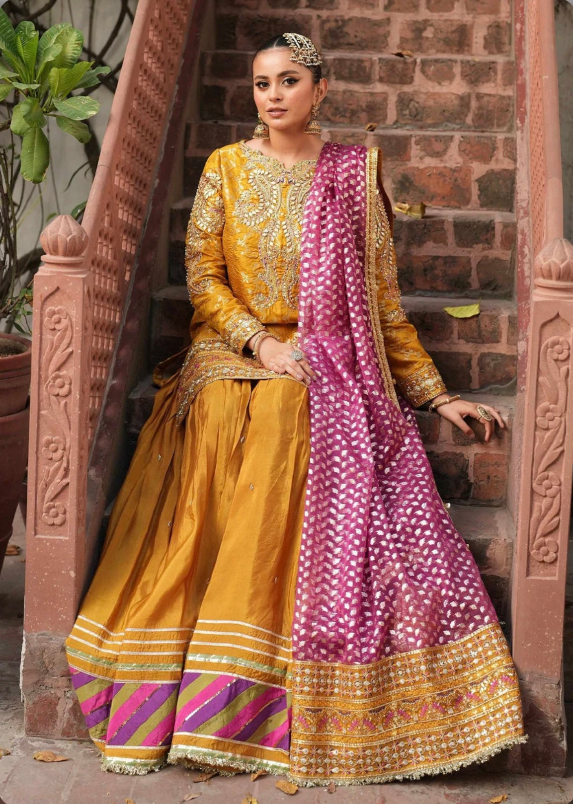 Yellow super stunning sharara set with pink dupatta