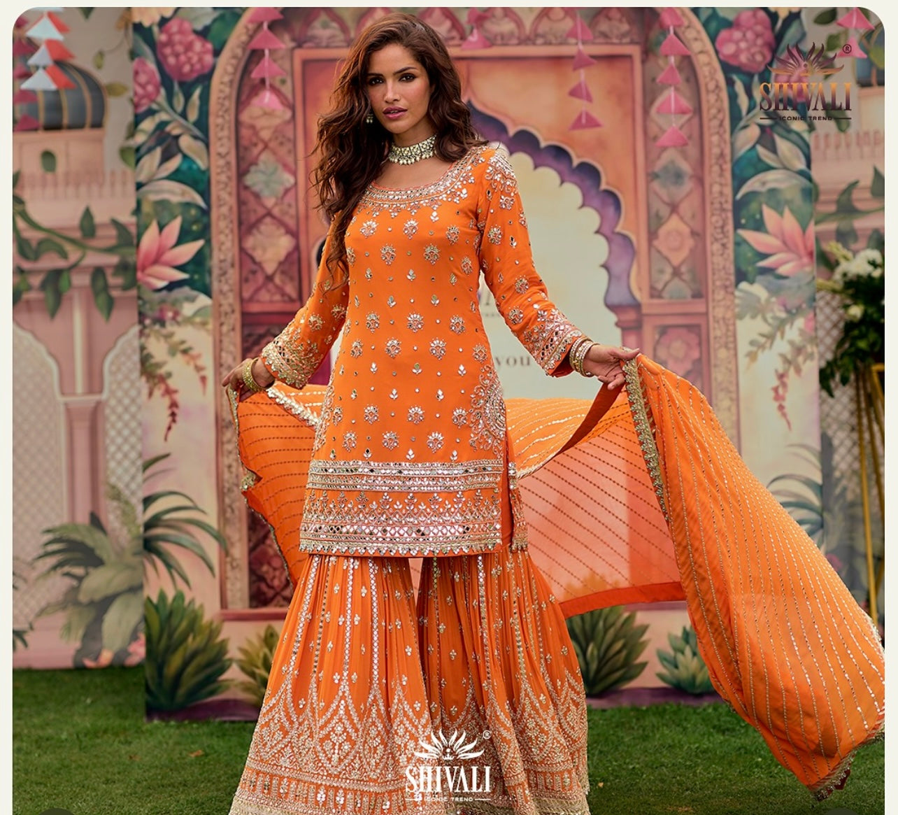 Orange heavy handwork mirrorwork partywear sharara suit