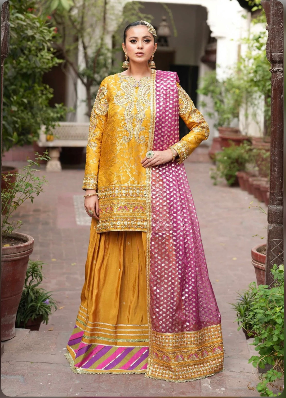 Yellow super stunning sharara set with pink dupatta