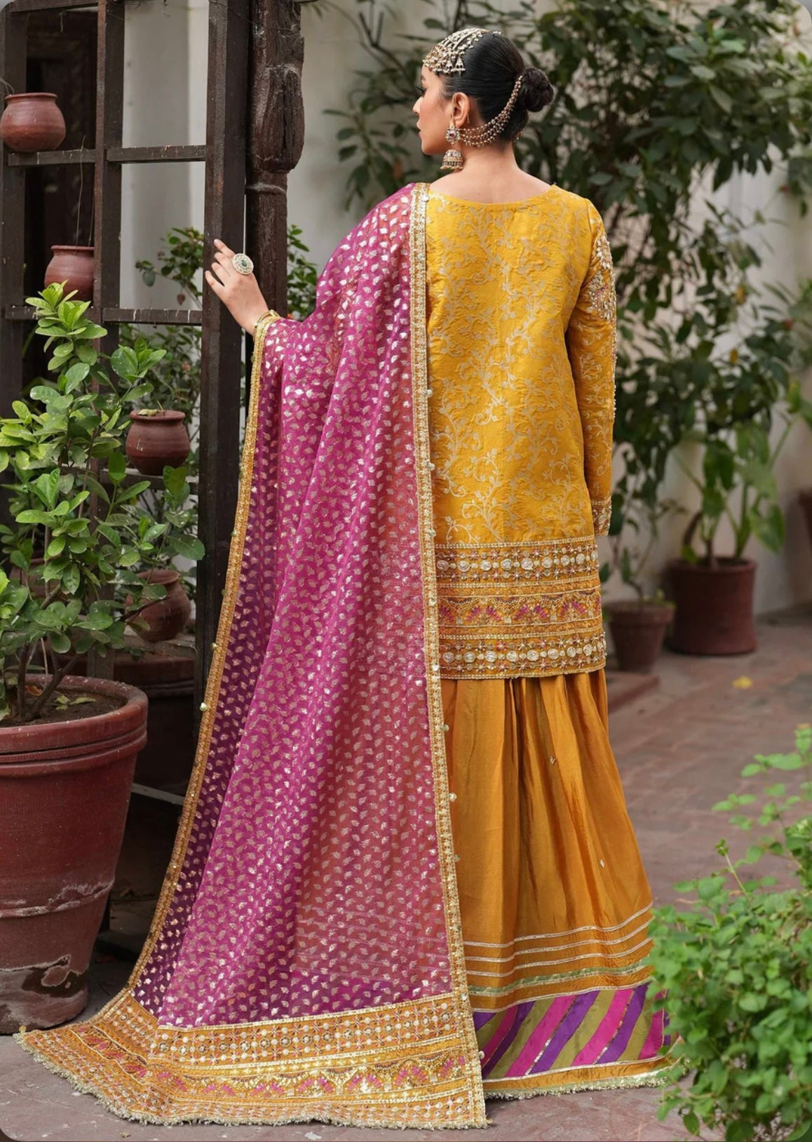 Yellow super stunning sharara set with pink dupatta