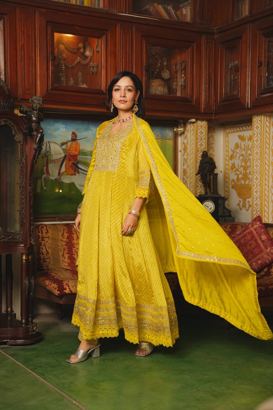 Yellow premium chinnon silk anarkali suit with heavy work