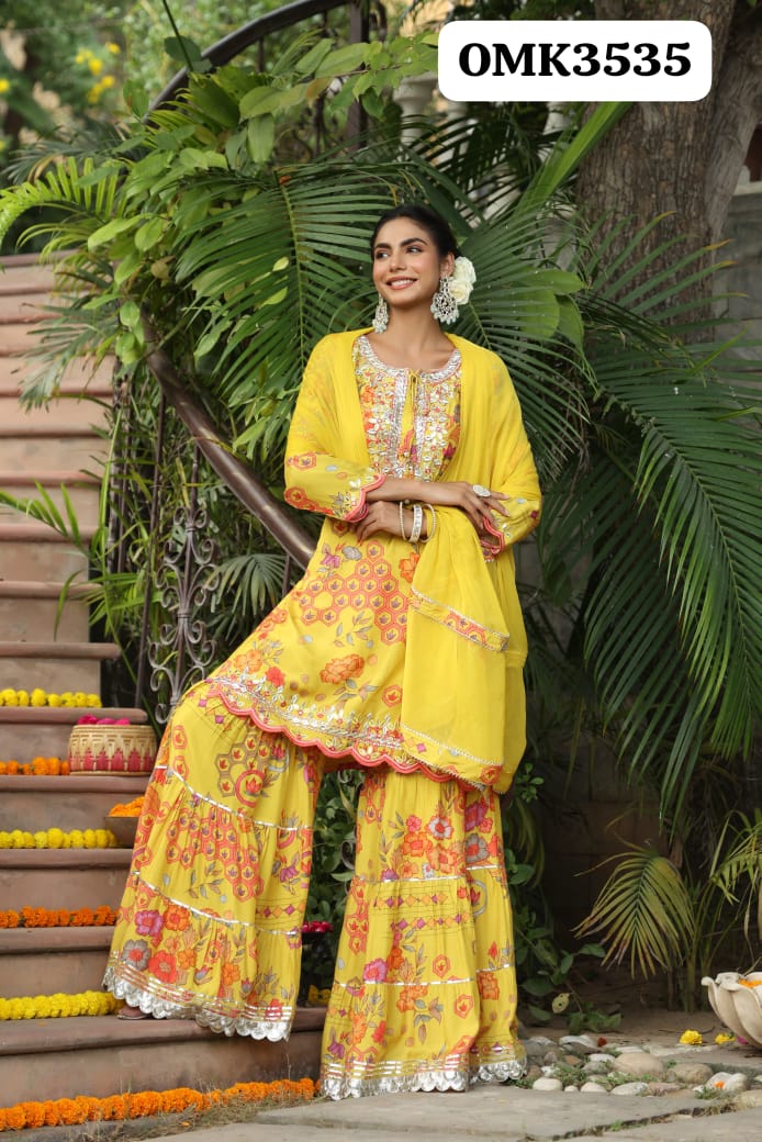 Yellow heavy gota work muslin sharara suit