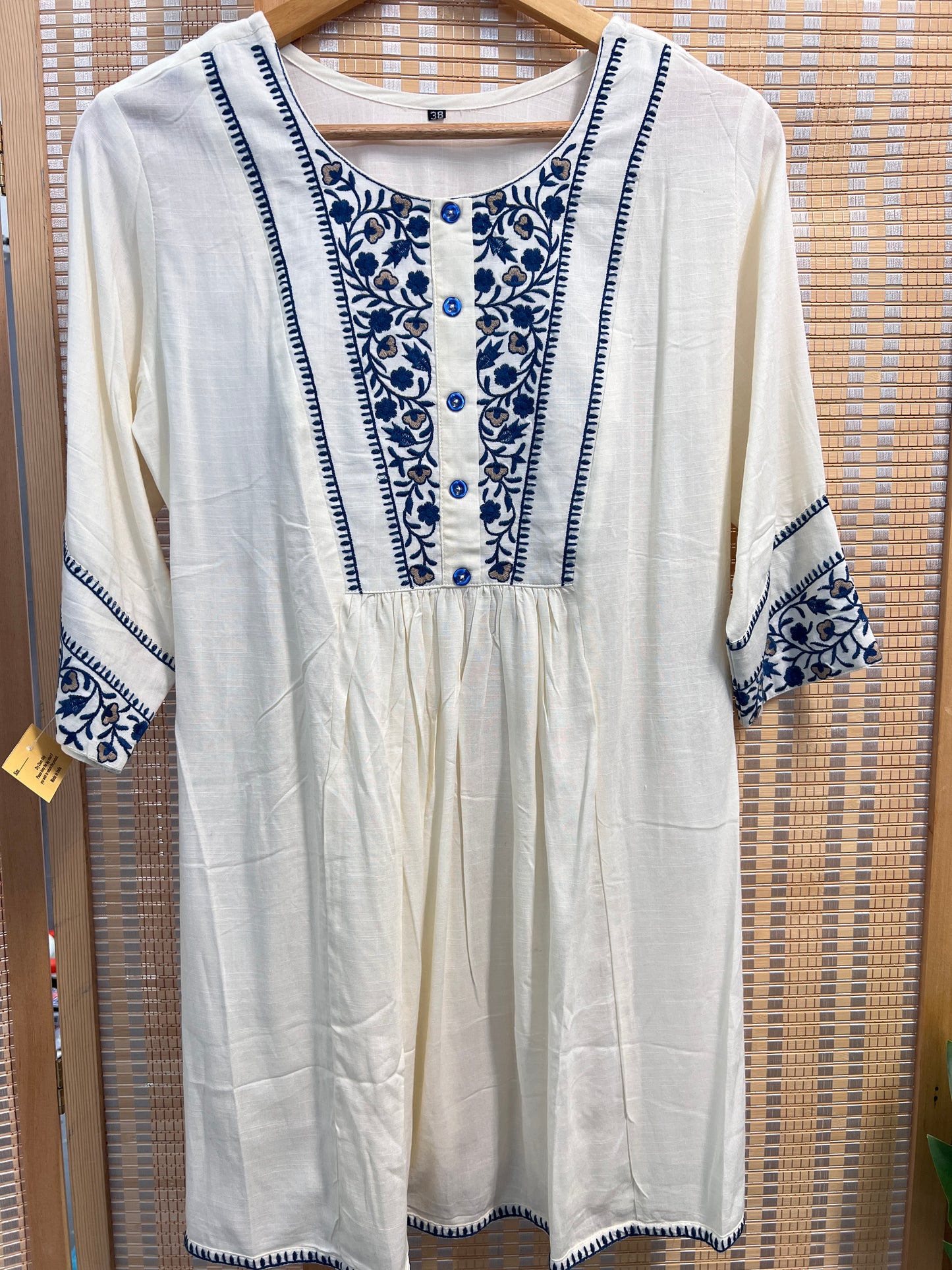 Off White beautiful embroidered summer short kurti