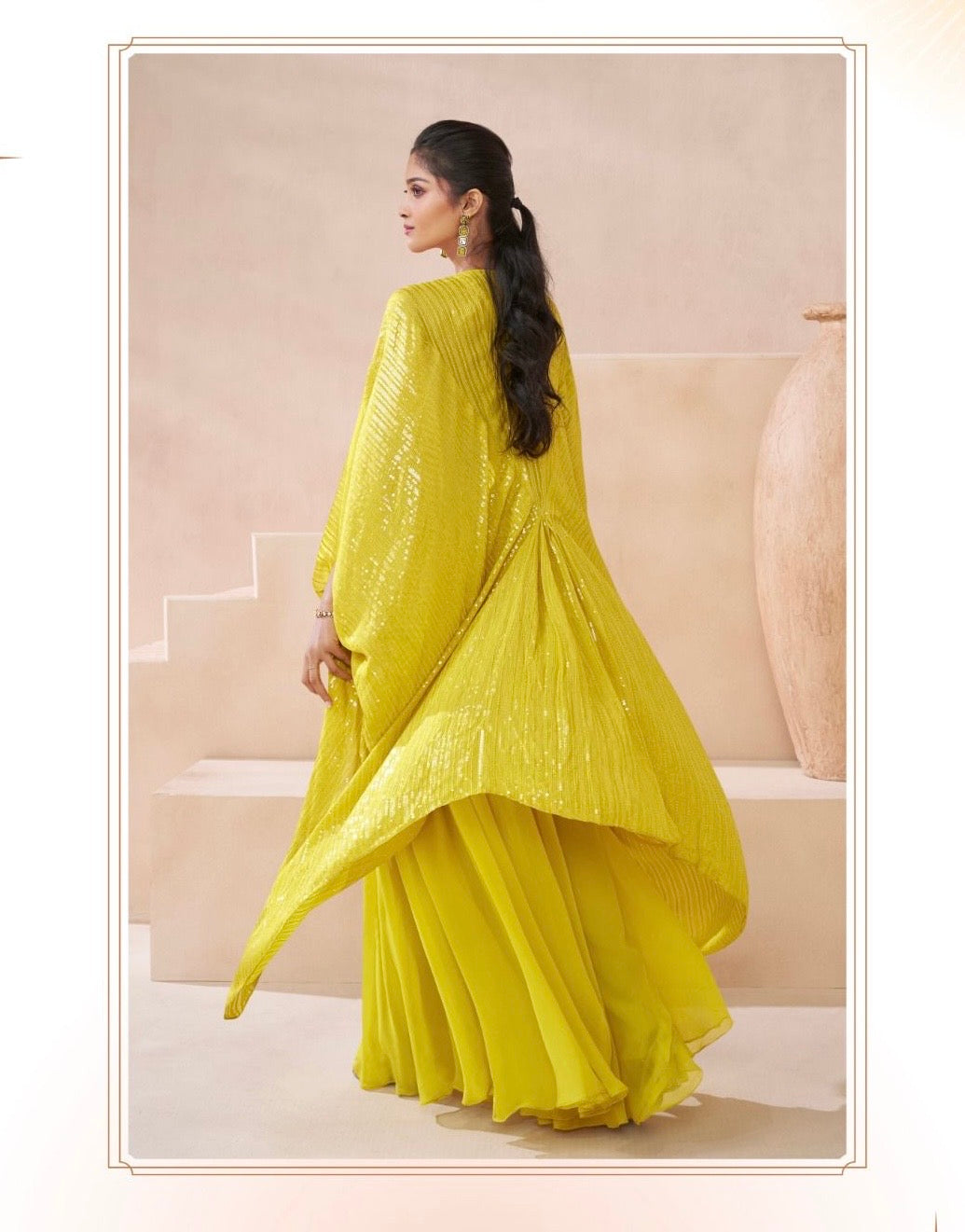 Yellow heavy handwork and all over sequence partywear cape set