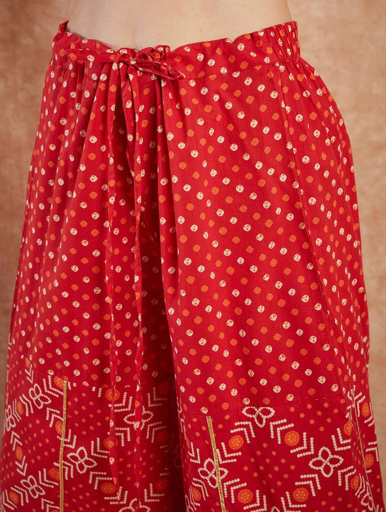 Red bandhni print Heavy gota work flared kurta Palazzo set