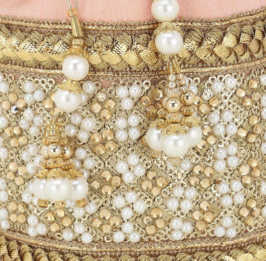 Peach Potli bag with Jardoshi and Pearl hand work