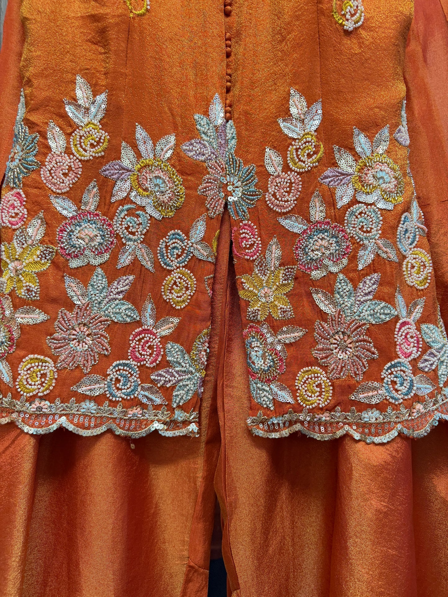 Orange rust heavy handwork sleeveless sharara suit