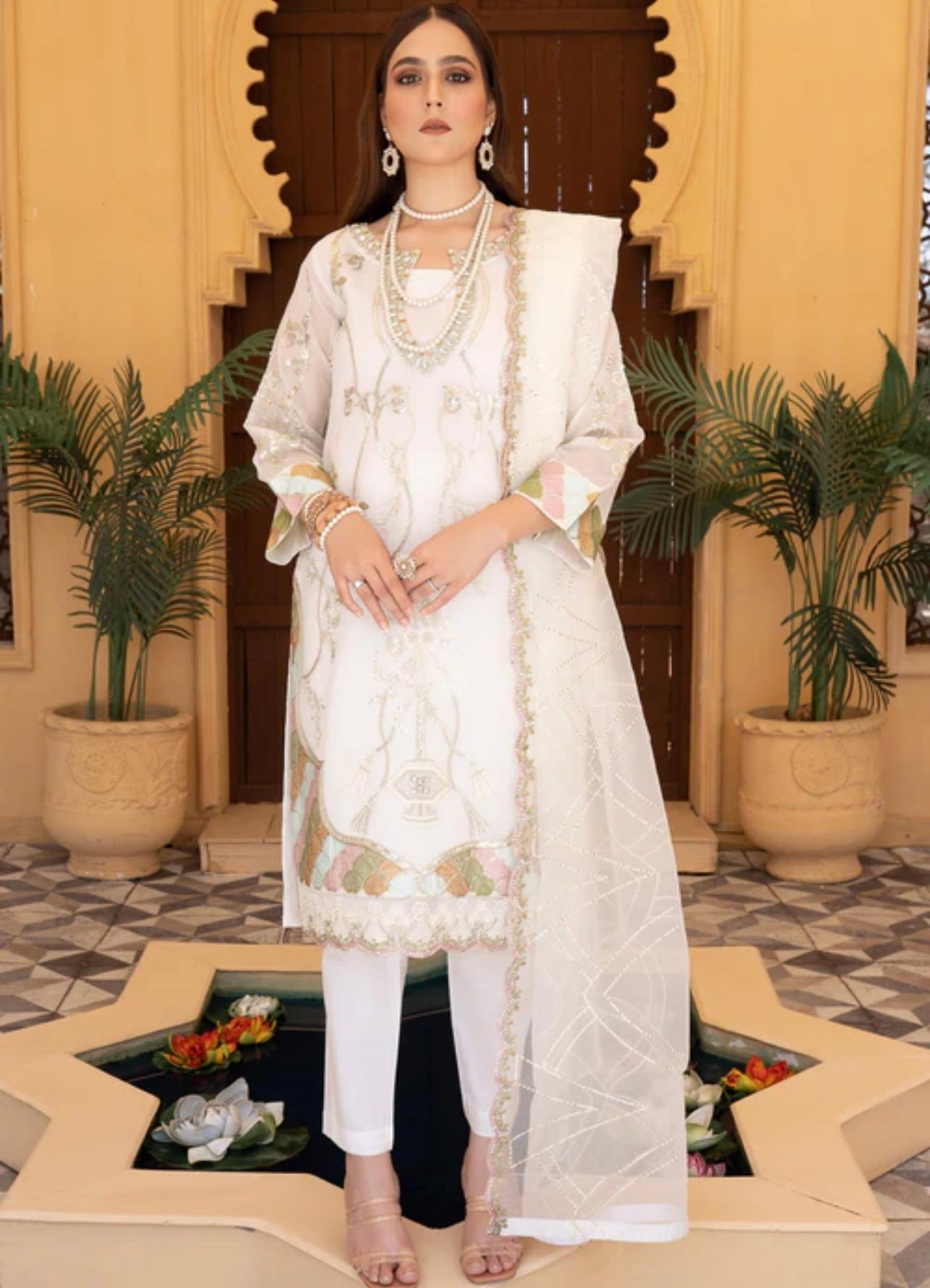 White elegant handwork embroidered and sequence work suit