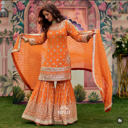 Orange heavy handwork mirrorwork partywear sharara suit