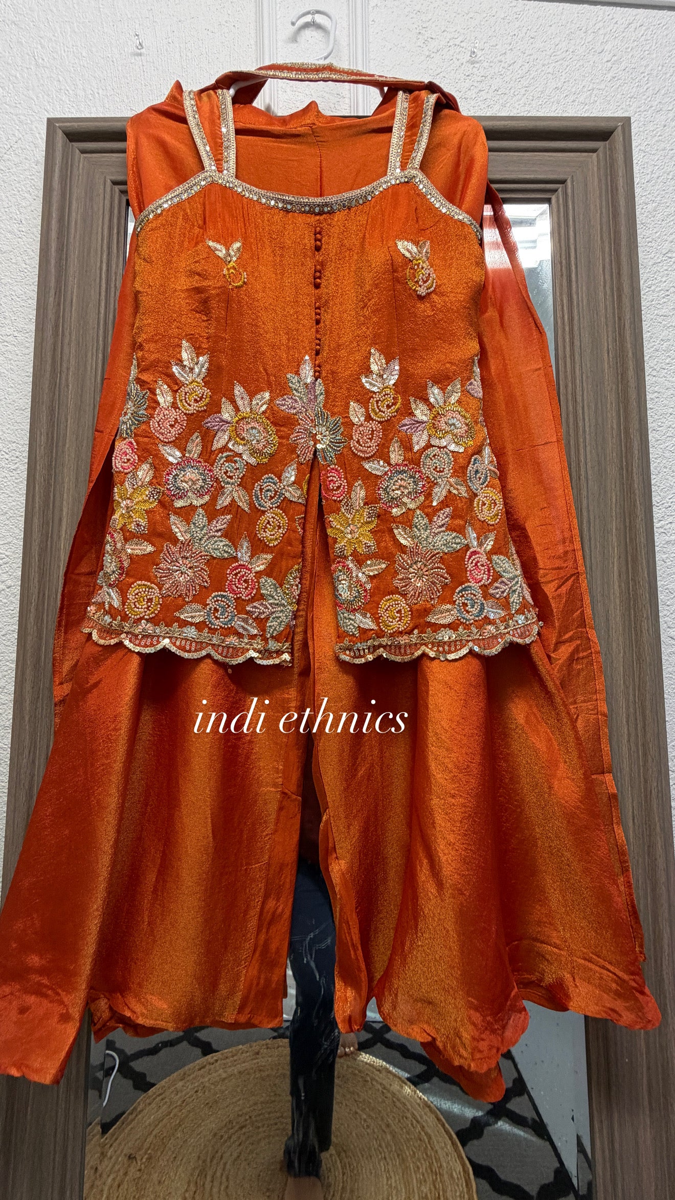Orange rust heavy handwork sleeveless sharara suit