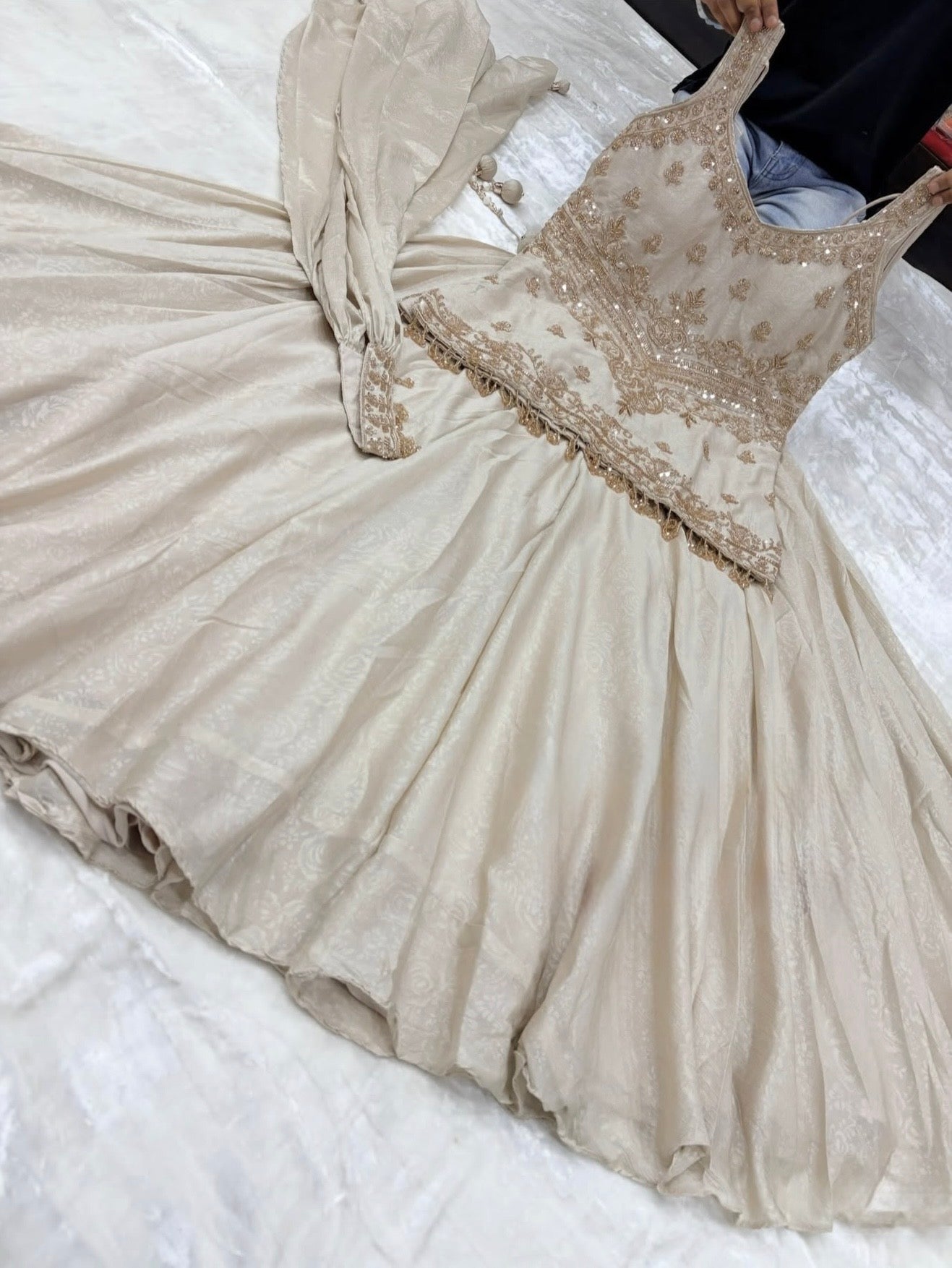 Off white with gold stunning handwork sharara suit