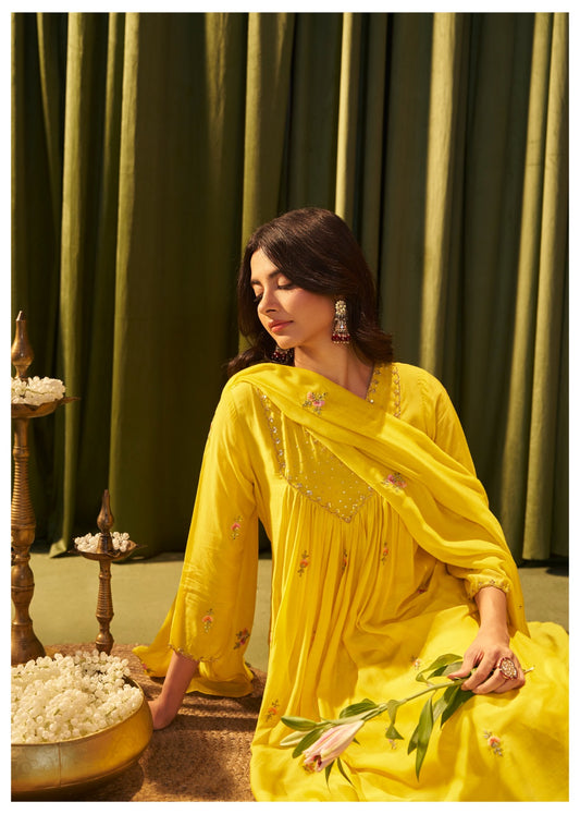 Yellow pure mul chanderi handwork yoke suit