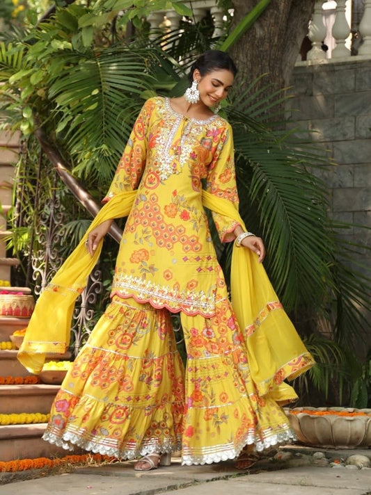 Yellow heavy gota work muslin sharara suit