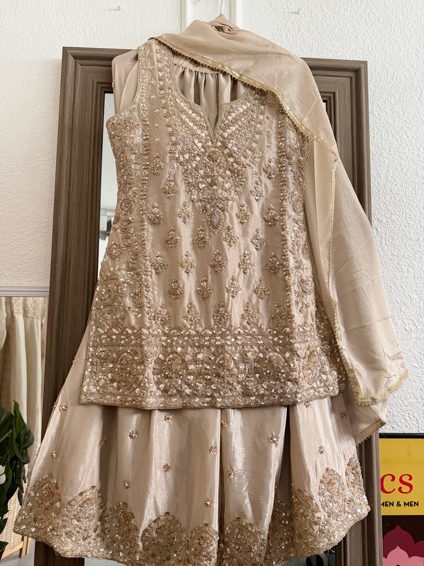 Beige and gold heavy handwork sharara suit