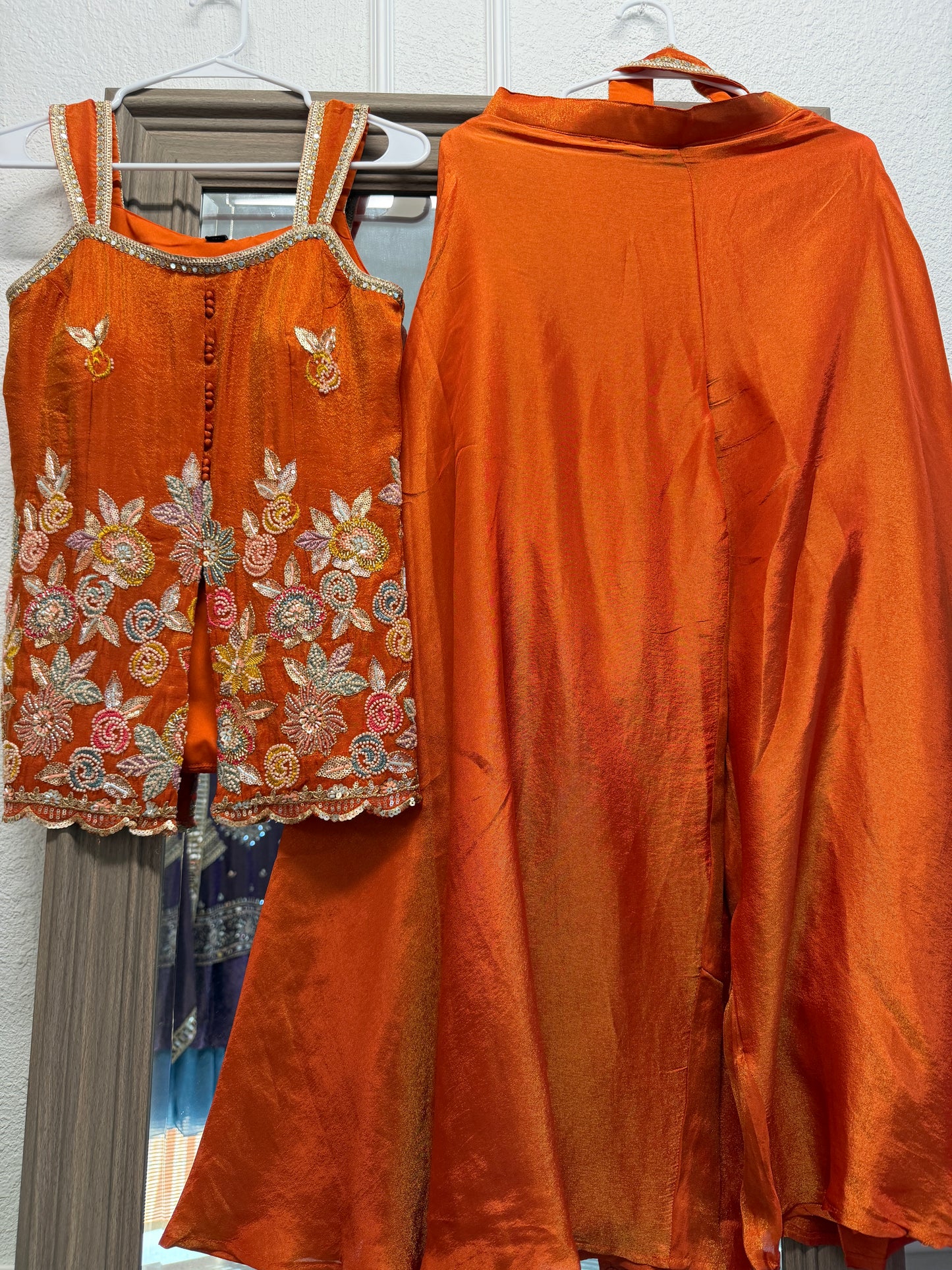 Orange rust heavy handwork sleeveless sharara suit