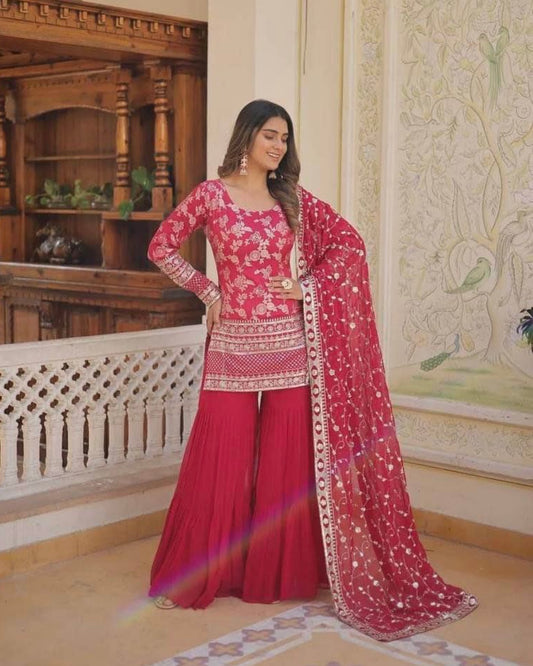 Dark pink sharara suit with heavy embroidered dupatta