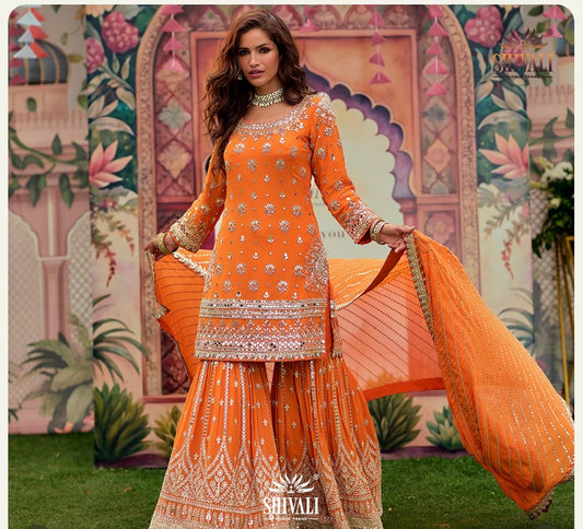 Orange heavy handwork mirrorwork partywear sharara suit