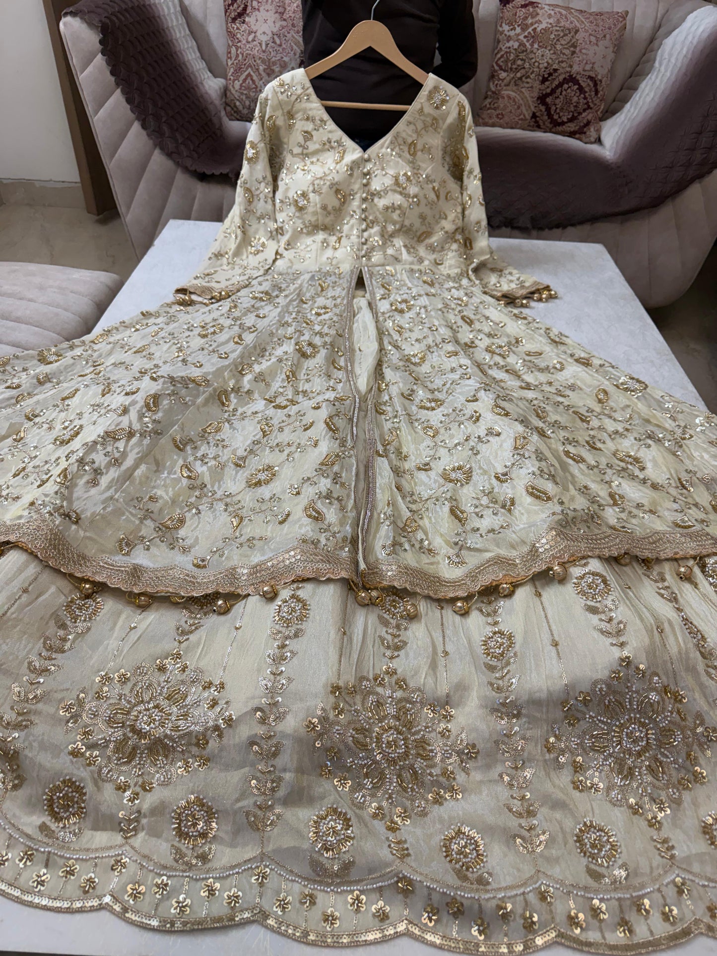 Golden heavy handwork tissue silk front slit lehenga