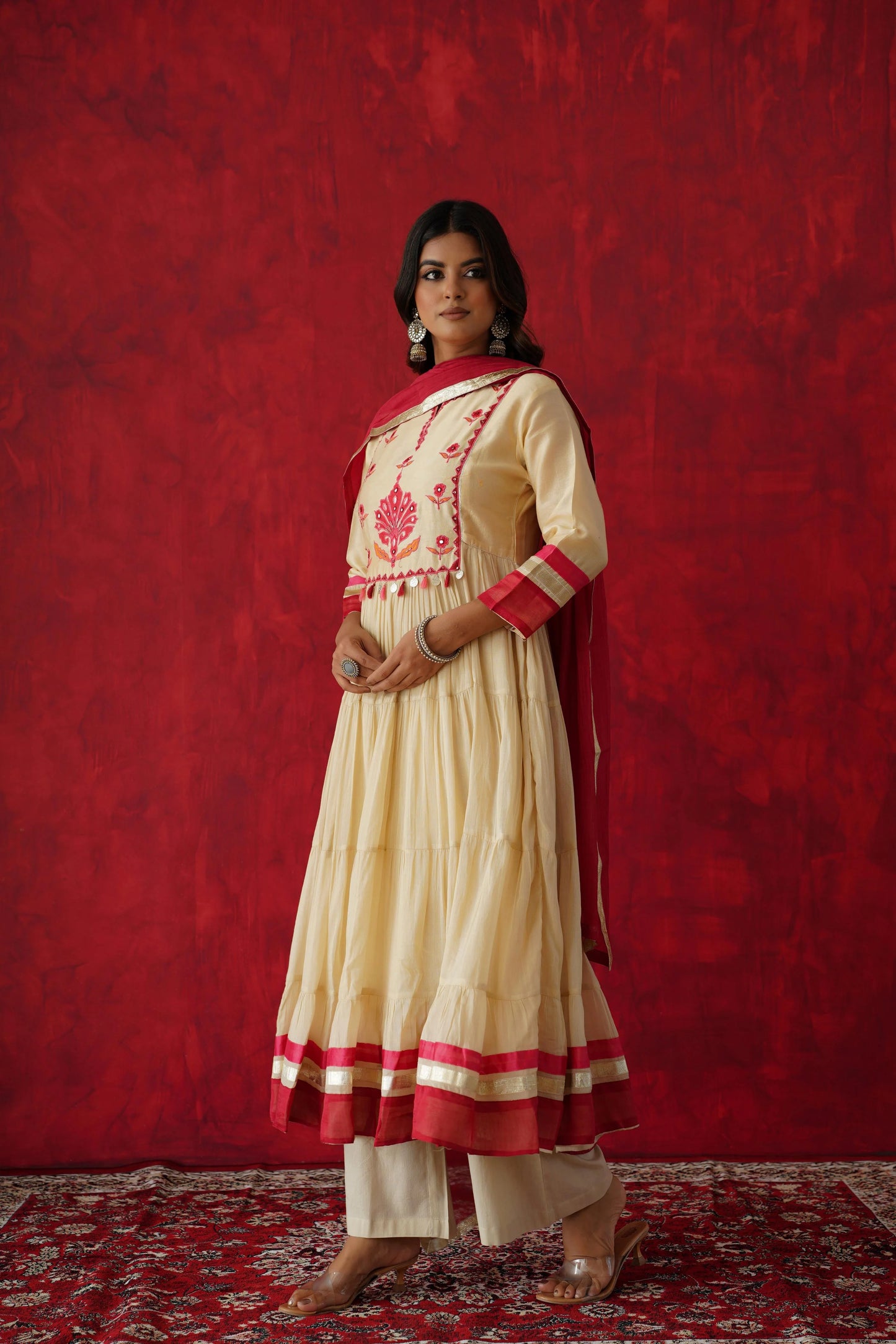 Off white and red Anarkali kurta set
