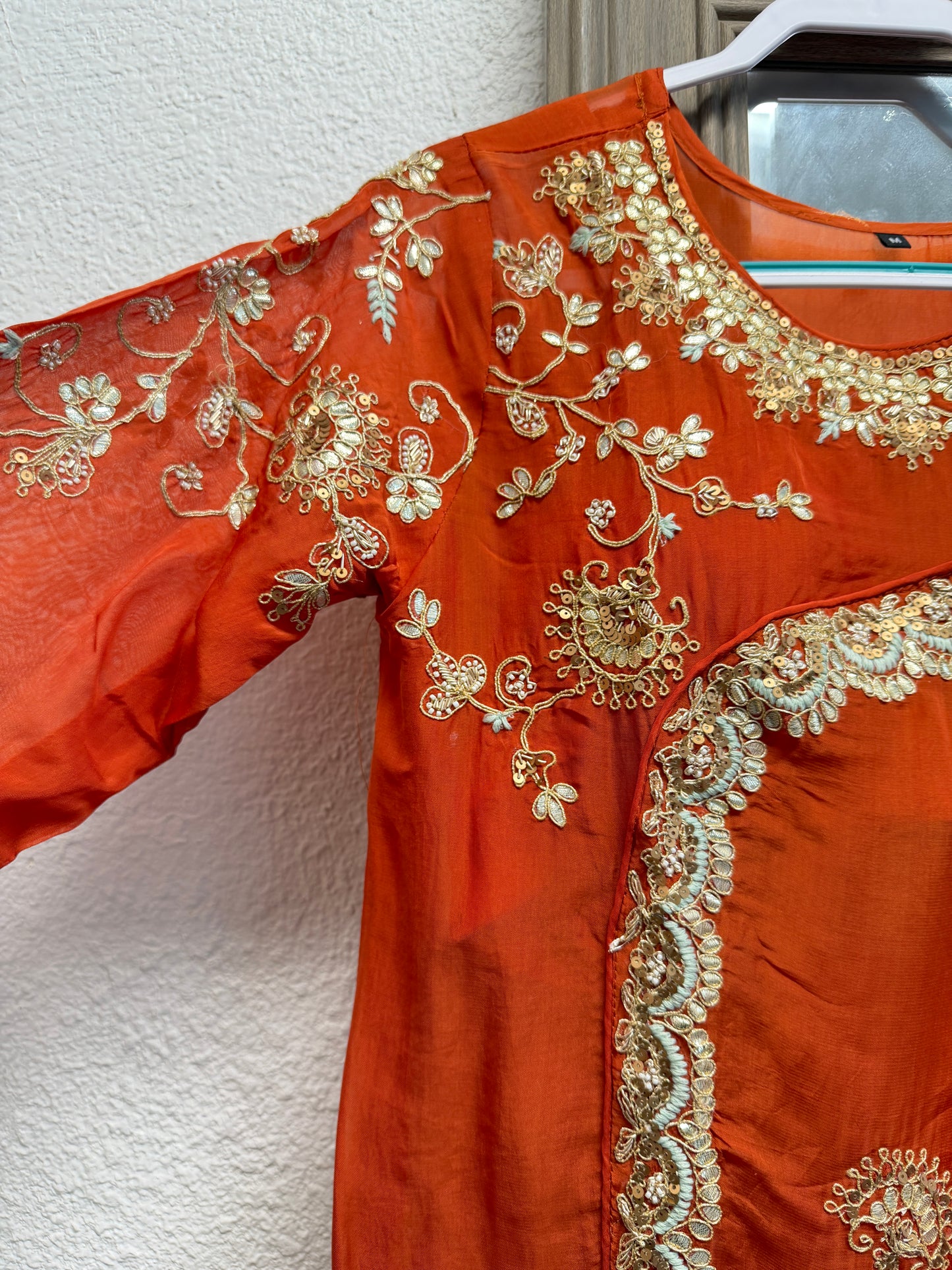 Rust orange short top with divider sharara pants