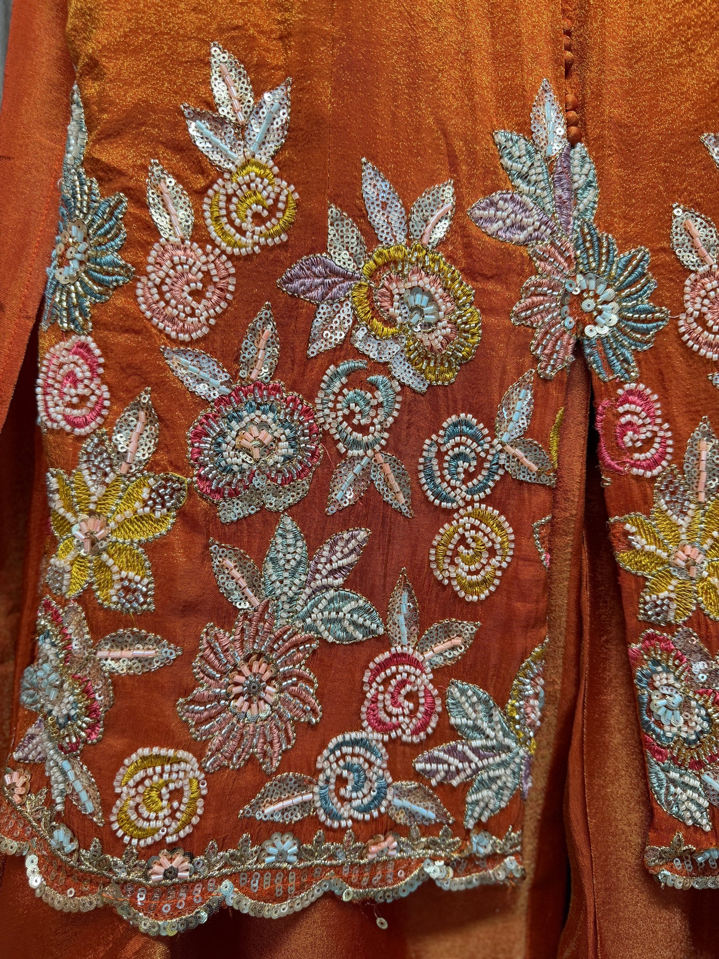 Orange rust heavy handwork sleeveless sharara suit
