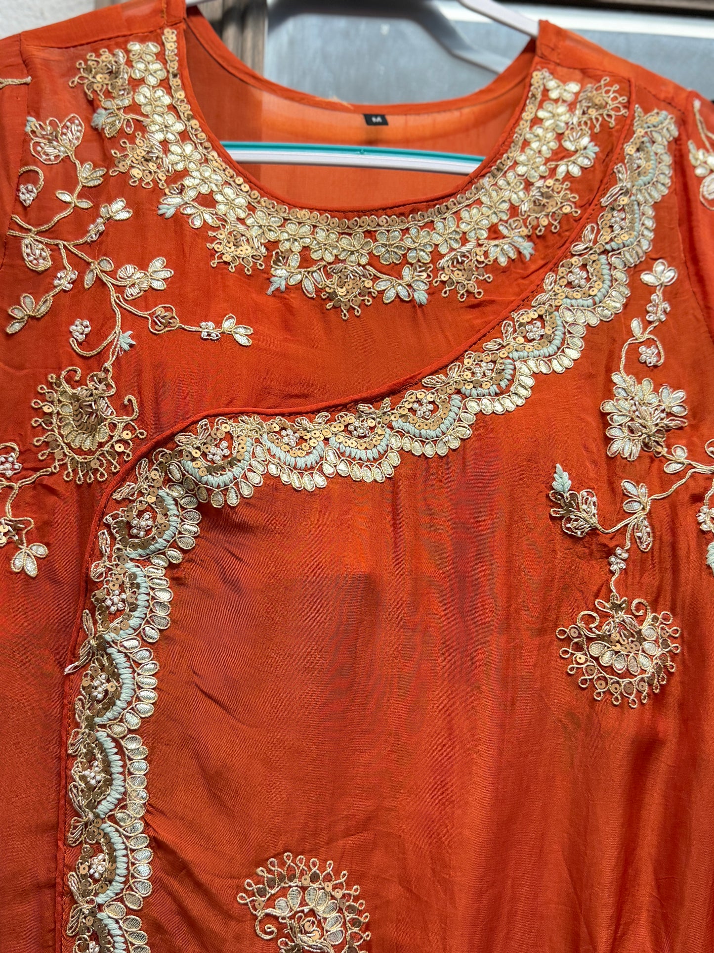 Rust orange short top with divider sharara pants