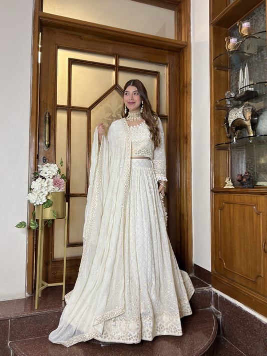Off white chikankari lehenga with sequence work