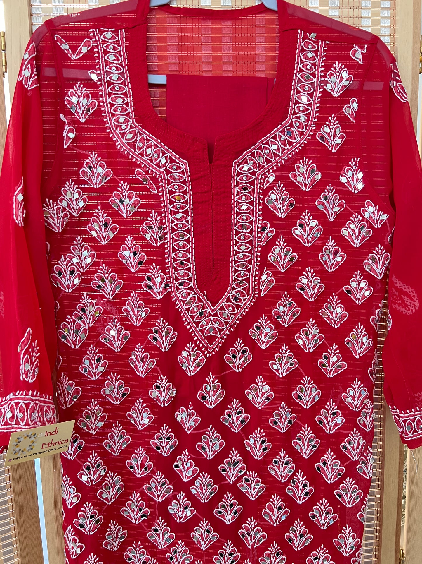 Red chikankari mirror work kurti with lining