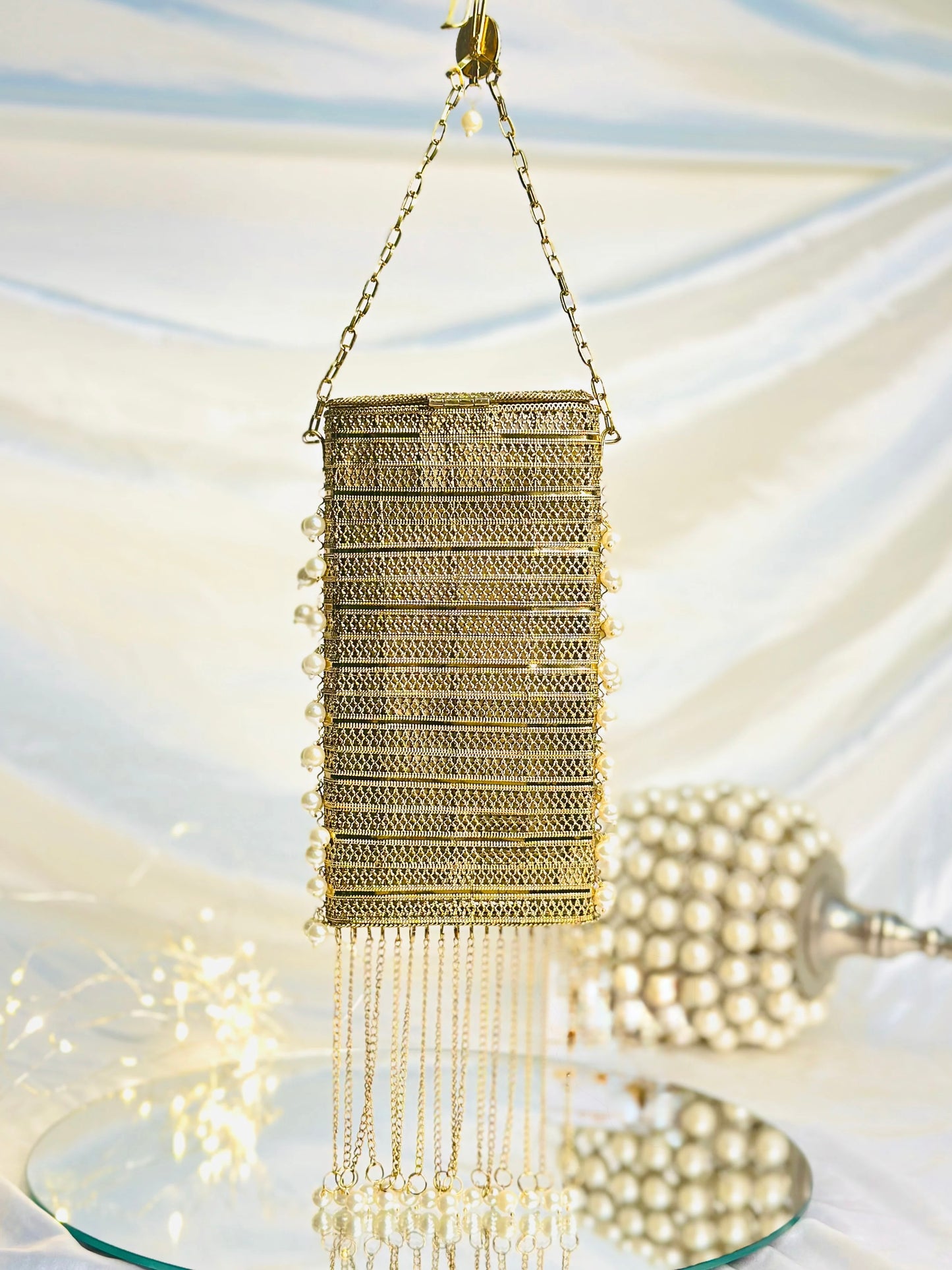 Classy gold metal phone bag