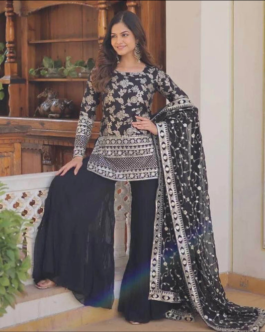 Black sharara suit with heavy embroidered dupatta