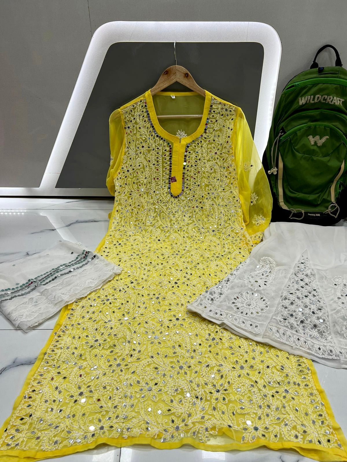 Yellow Heavy mirror chikankari kurti with lining