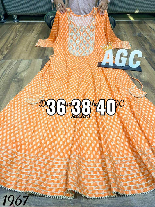 Orange premium rayon Flairy Gown with Gota Work