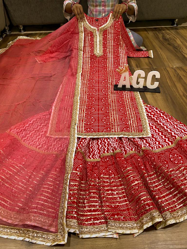 Beautiful Festive red heavy gota work sharara set