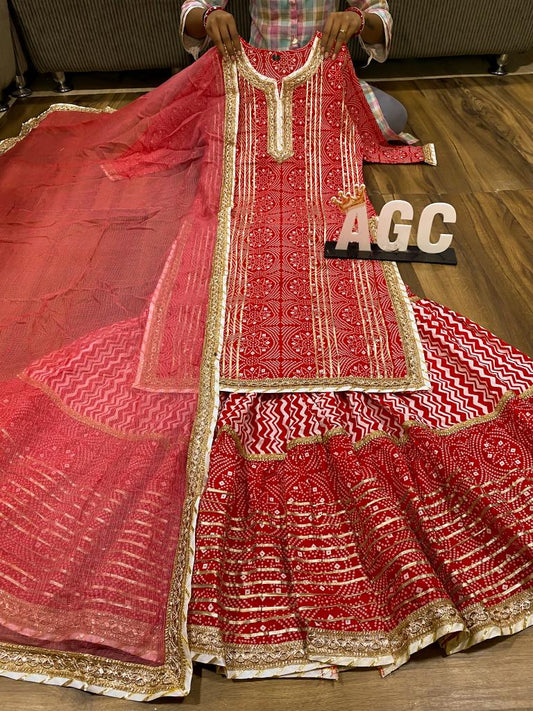 Beautiful Festive red heavy gota work sharara set