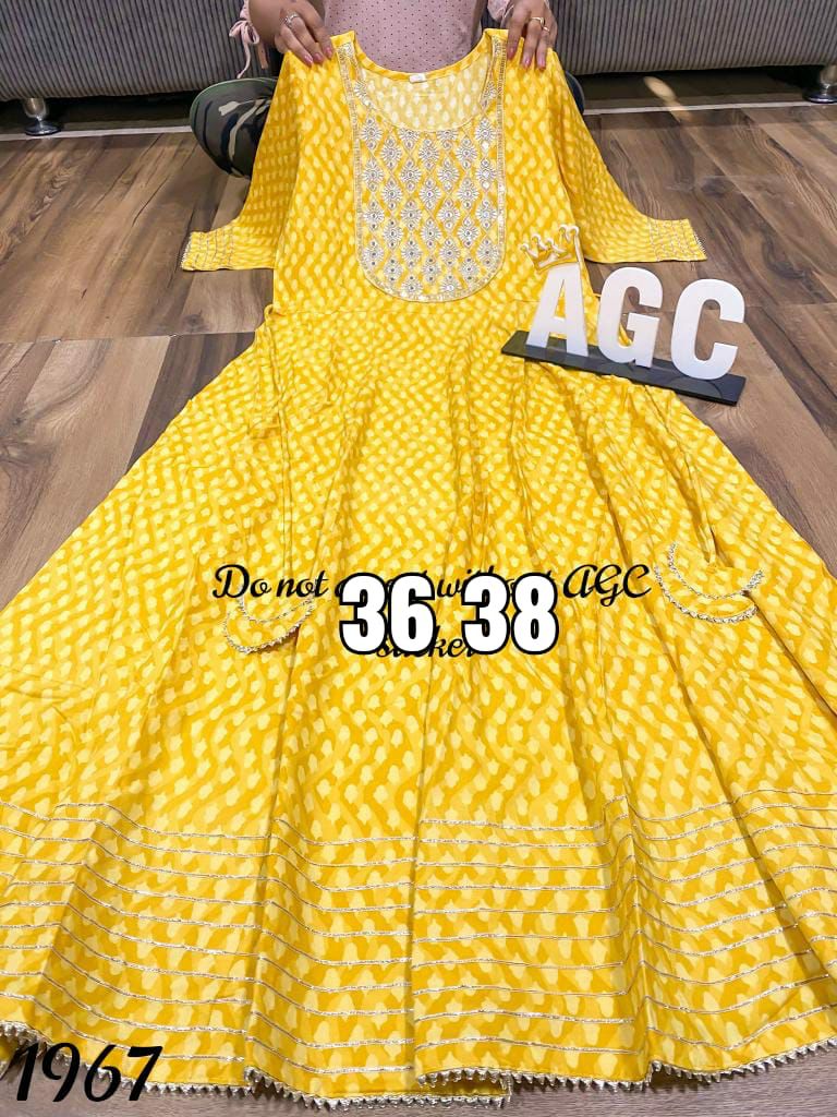 Yellow Premium Rayon Flairy Gota work Gown