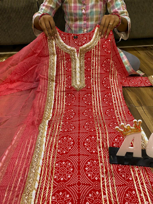 Beautiful Festive red heavy gota work sharara set