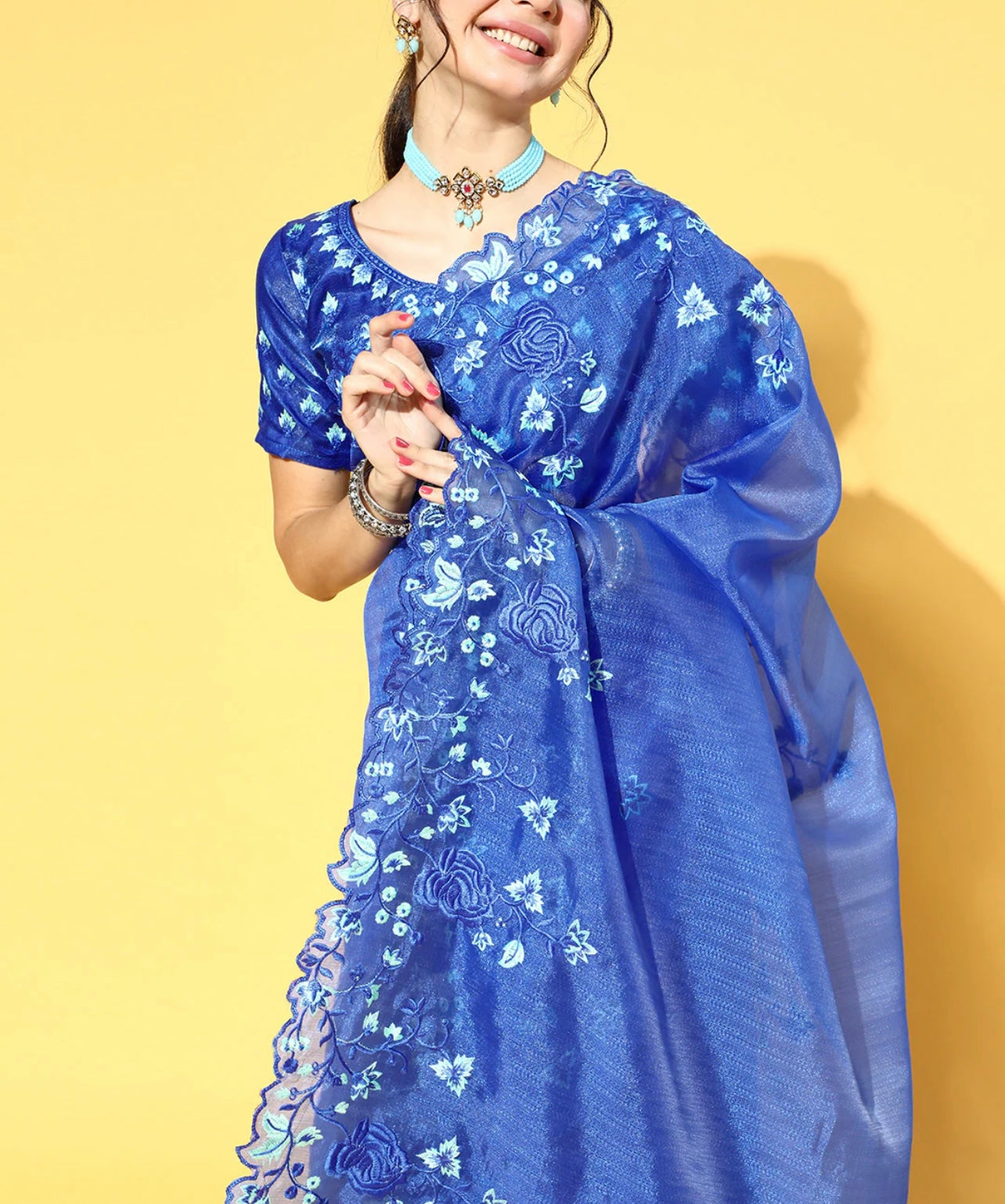 Blue floral emroidered organza saree with unstitched blouse