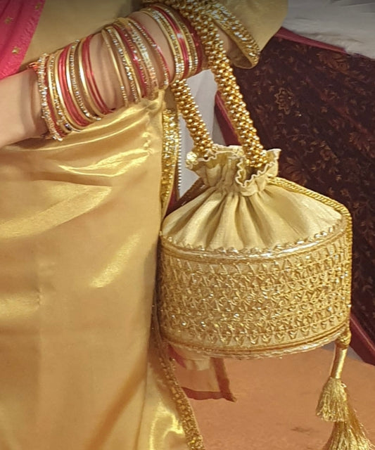 Golden Potli bag with All over Gota work